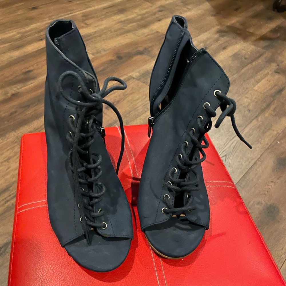 Navy Booties heels, size 9W, very good condition.